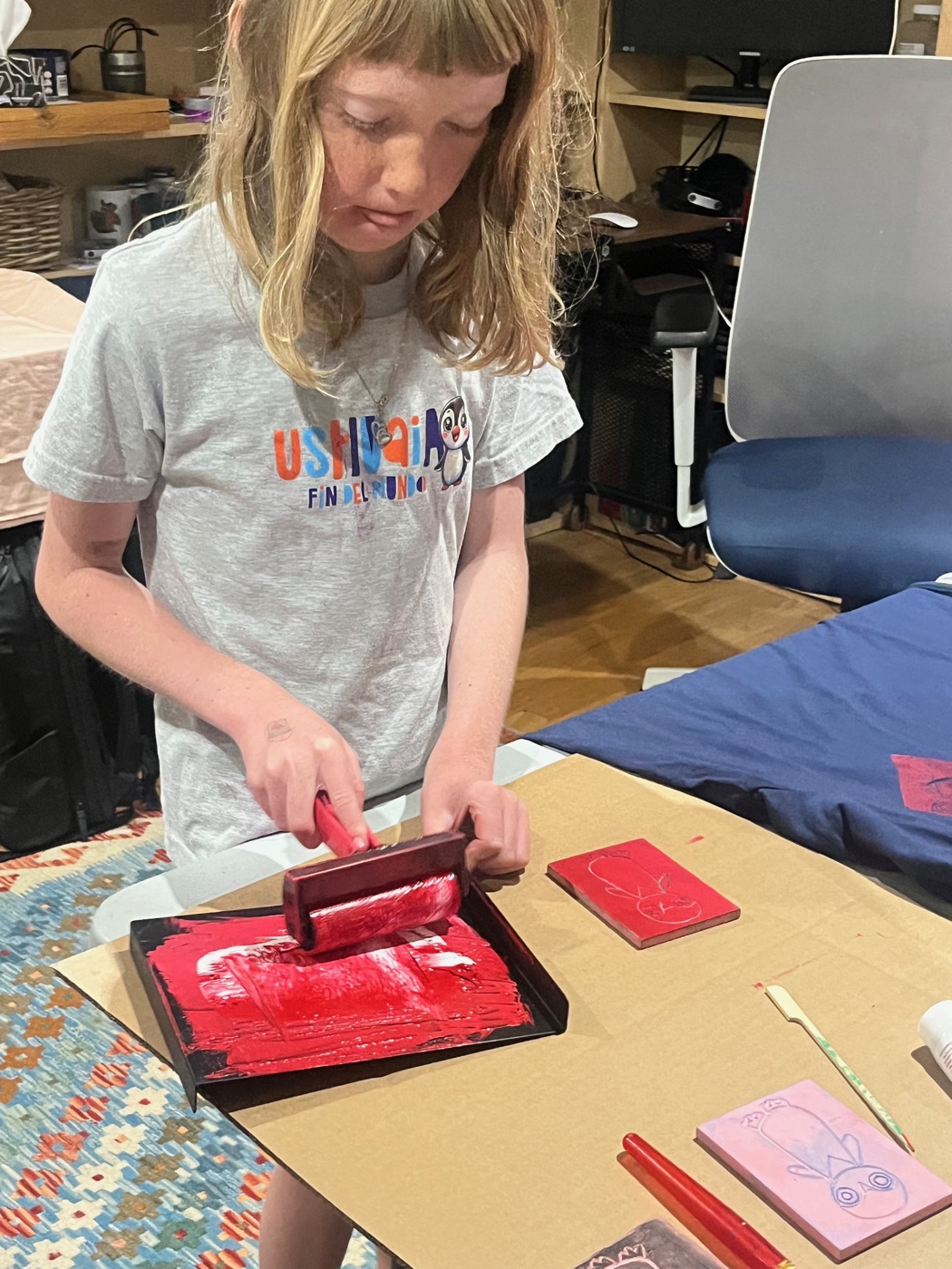 Beatrix rolling ink onto the brayer