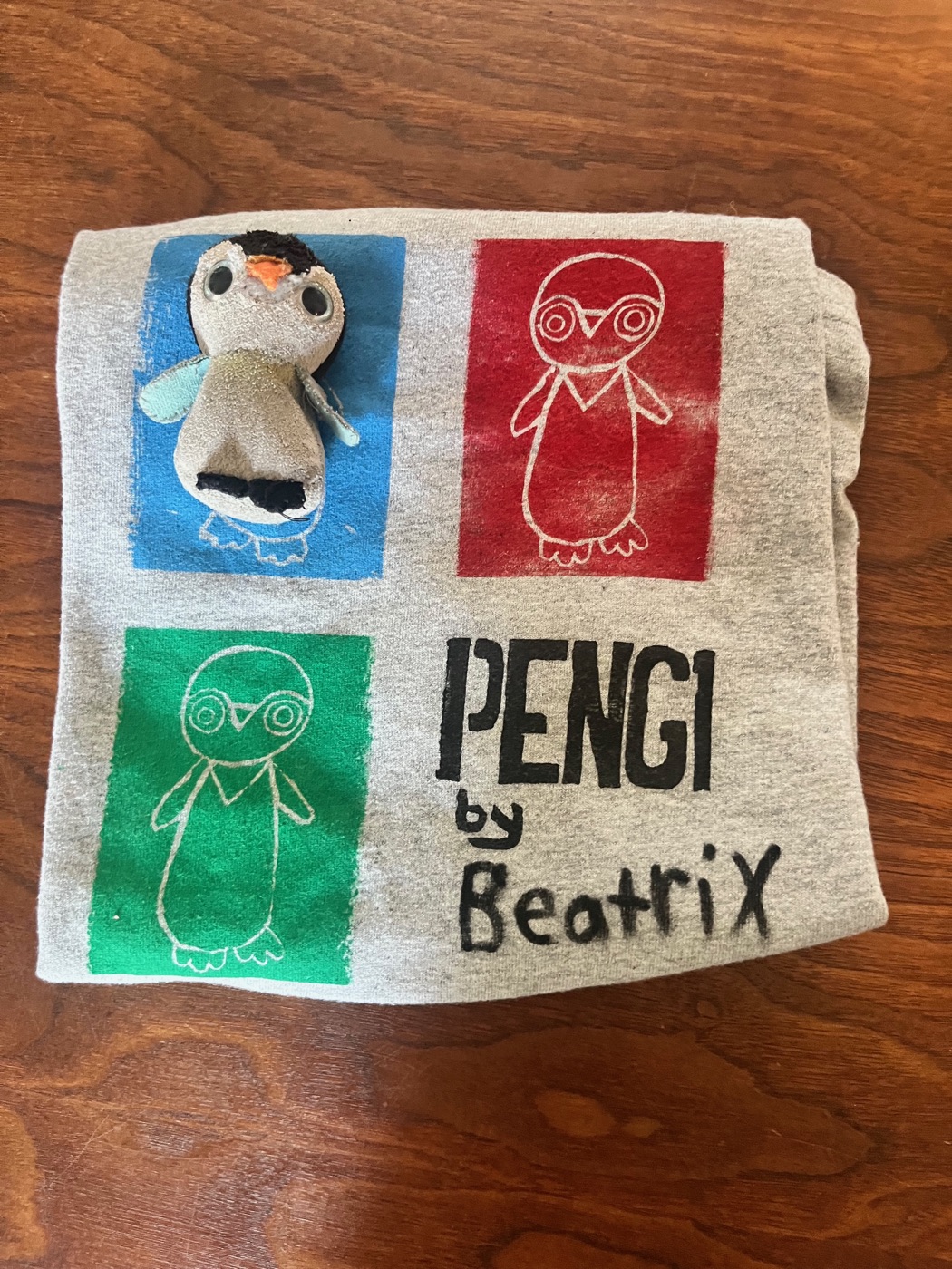Finished Pengi shirt with the stuffed penguin